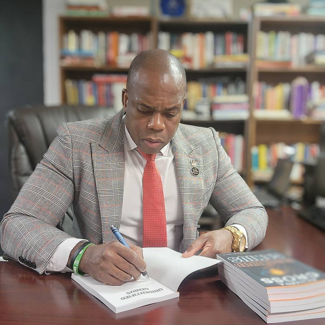 Dr. Richard A. Cross writing and developing leadership frameworks